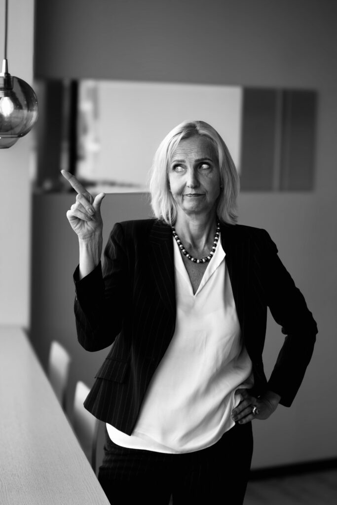 woman standing, finger, business strategist, AI automation course